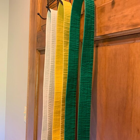 LOT OF 3 KARATE BELTS, WHITE, YELLOW, GREEN, ADULT, APPROX. 92" LONG - Picture 2 of 3